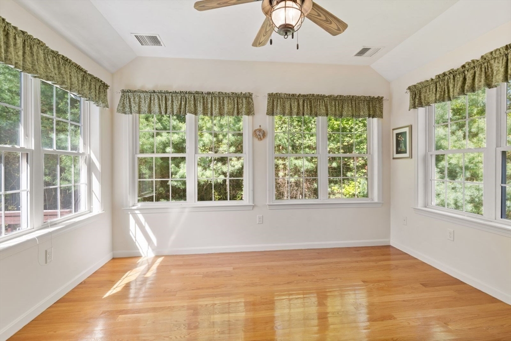 60 Brewster Road, Unit 60 Stoughton, MA 02072 - Photo 6 of 18 a view of an empty room with a window