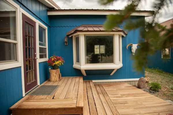a front view of a house with a porch
