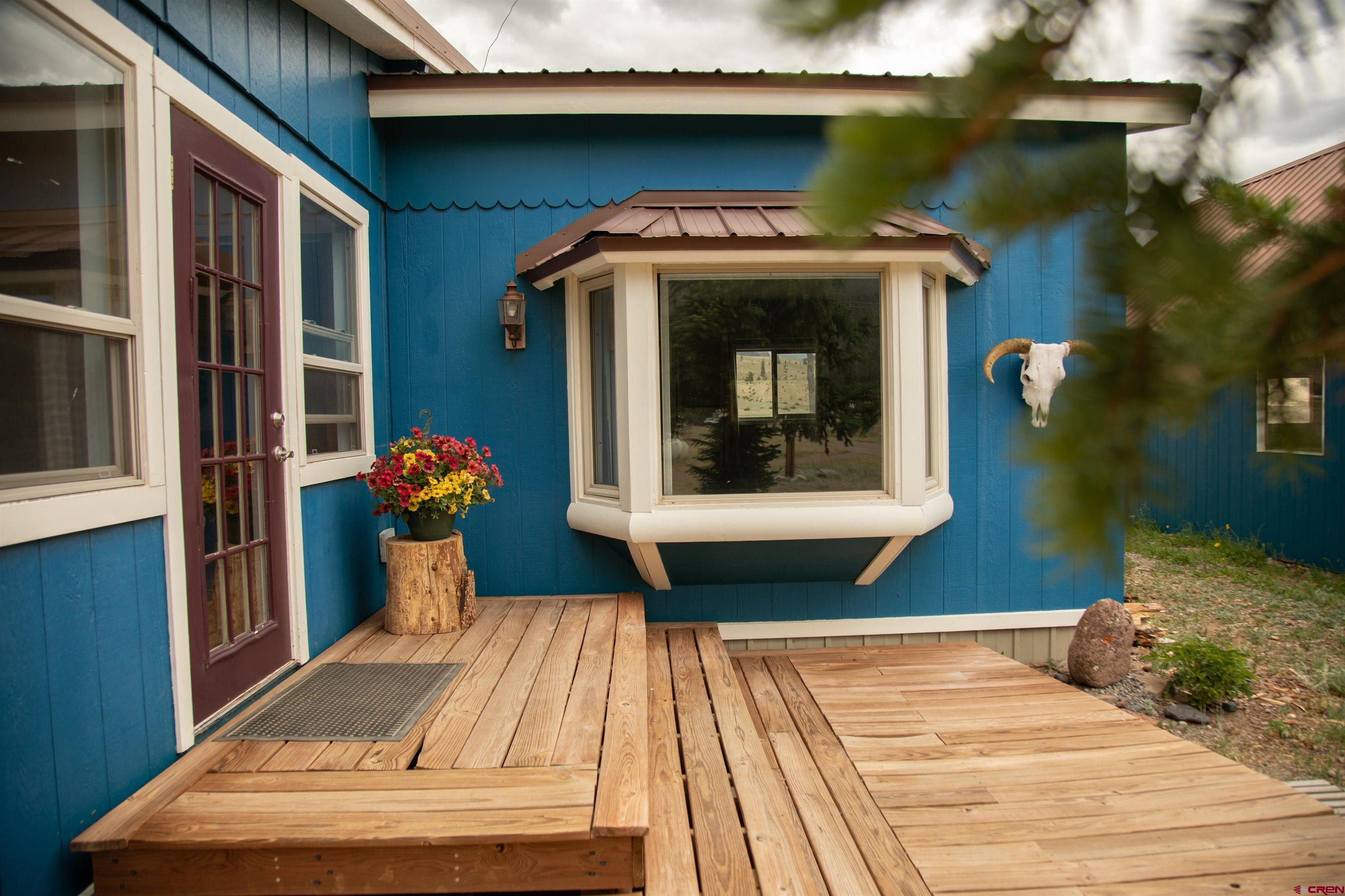 507 Ridge Drive Creede, CO 81130 - Photo 14 of 31 a front view of a house with a porch