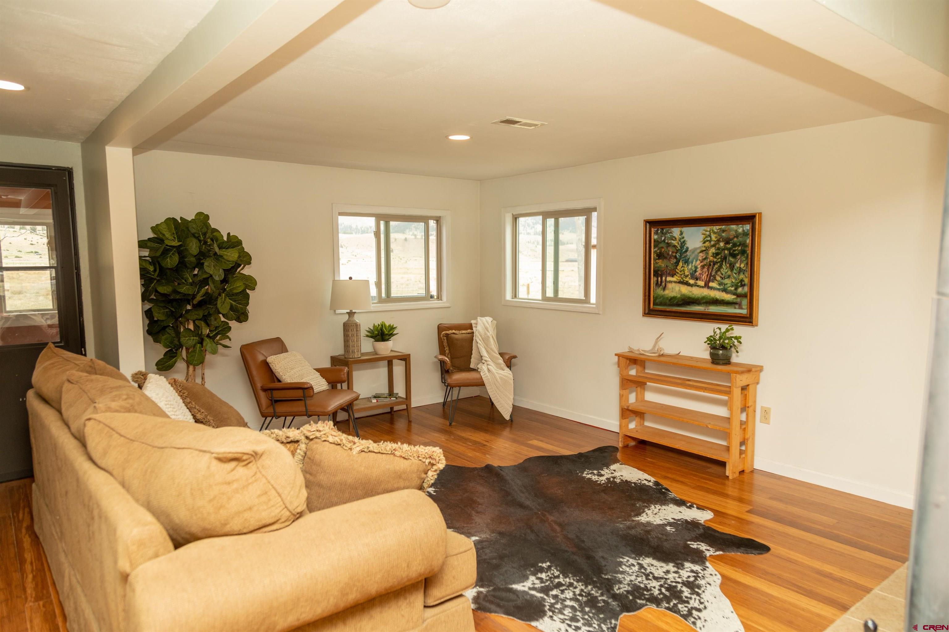 507 Ridge Drive Creede, CO 81130 - Photo 20 of 31 a living room with furniture and a window