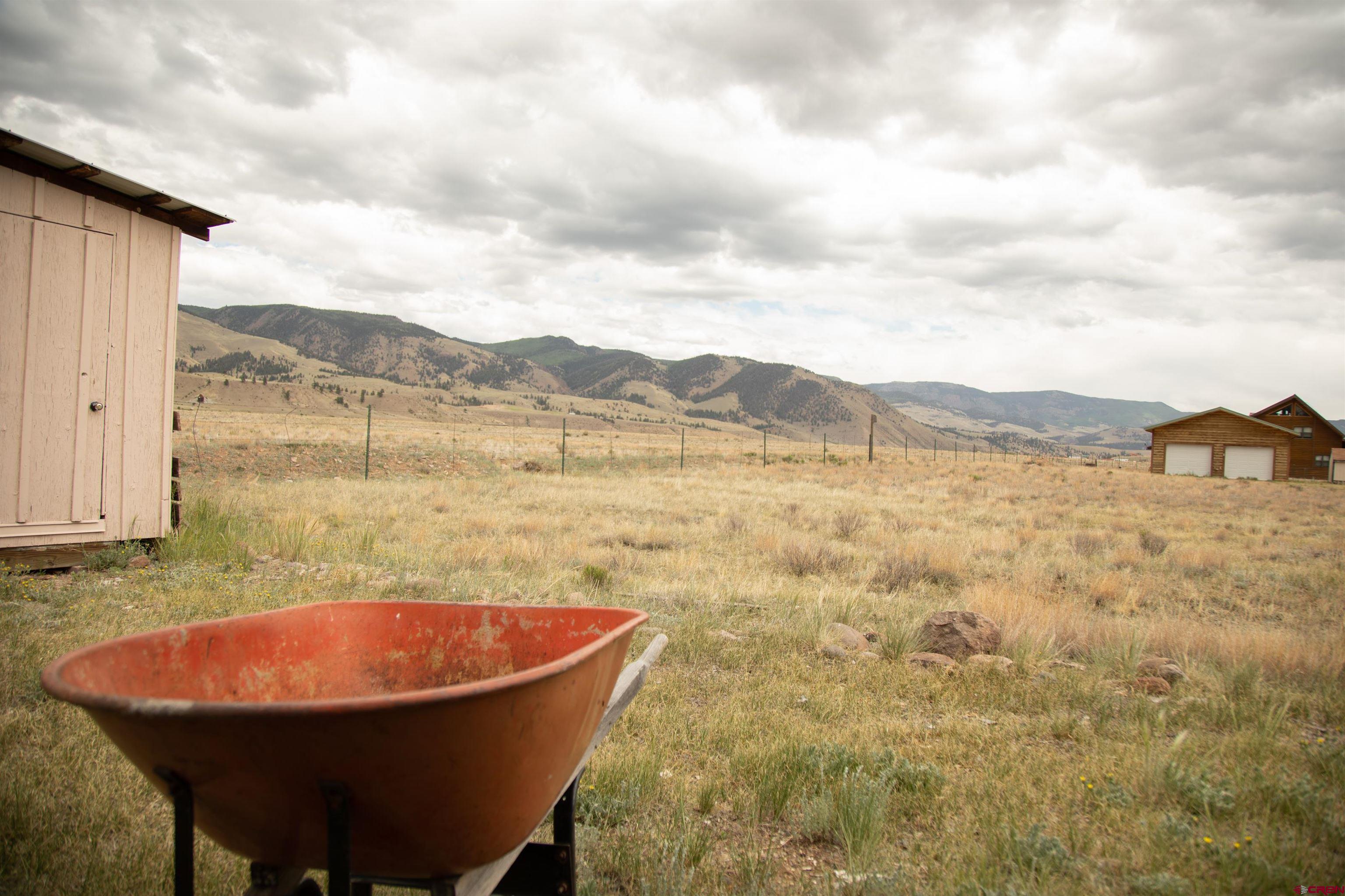 507 Ridge Drive Creede, CO 81130 - Photo 24 of 31 a view of a swimming pool with an outdoor seating