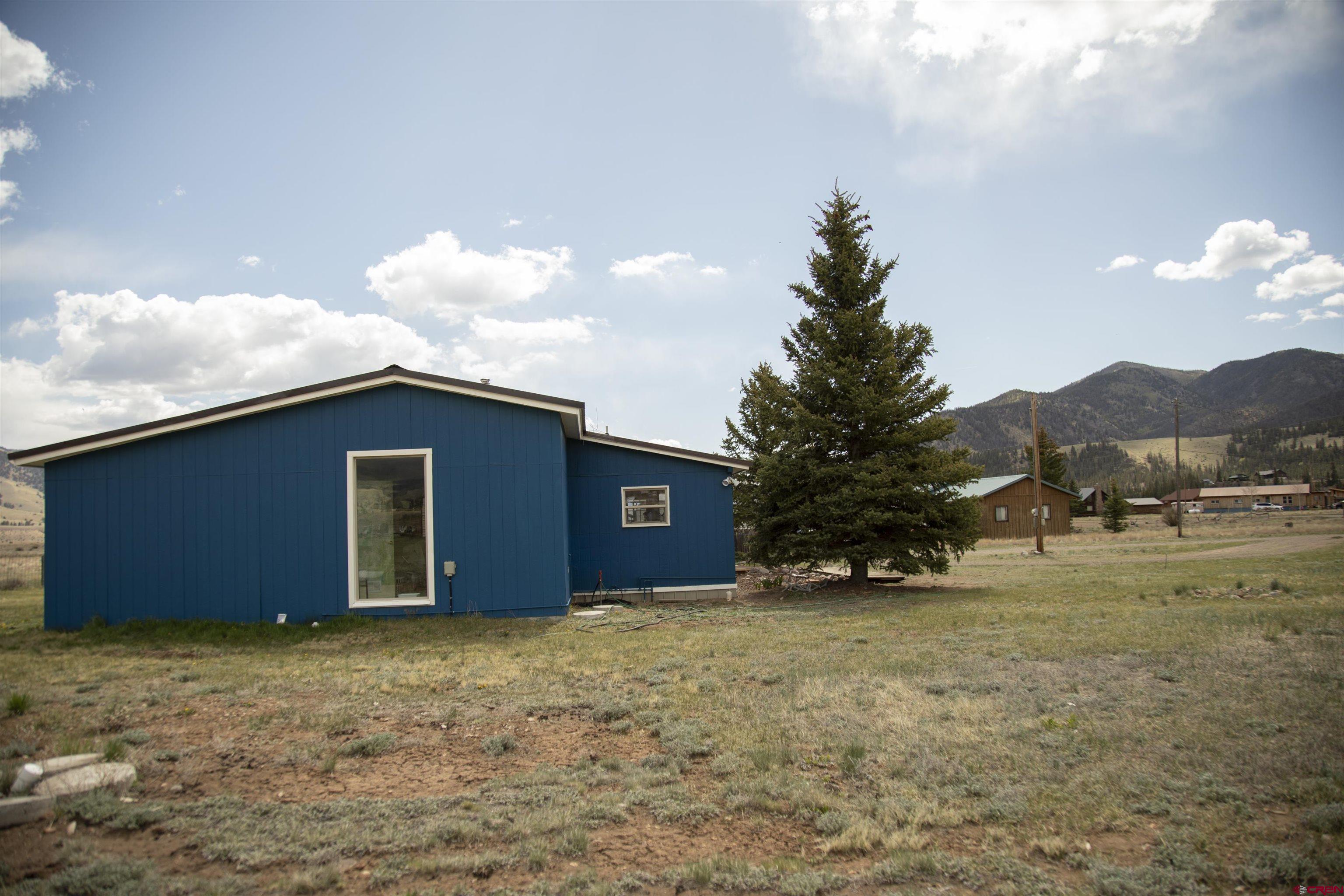 507 Ridge Drive Creede, CO 81130 - Photo 27 of 31 a view of a house with a yard