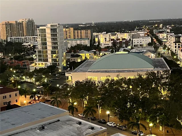 a view of city with ocean