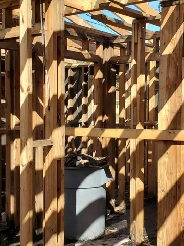 a view of a building with a parked car