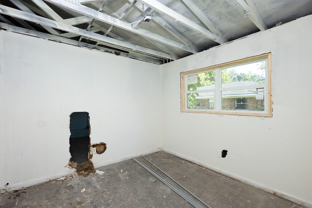 776 Terminal Court Columbus, GA 31906 - Photo 5 of 17 a room with gym equipment and a window