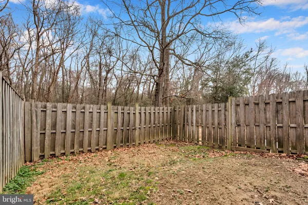 a row of wooden fence