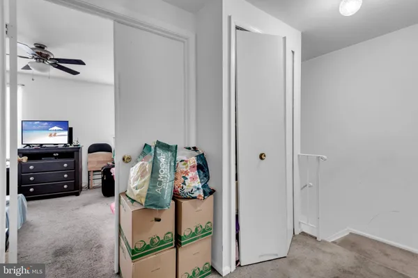 a view of a livingroom with furniture and a flat screen tv