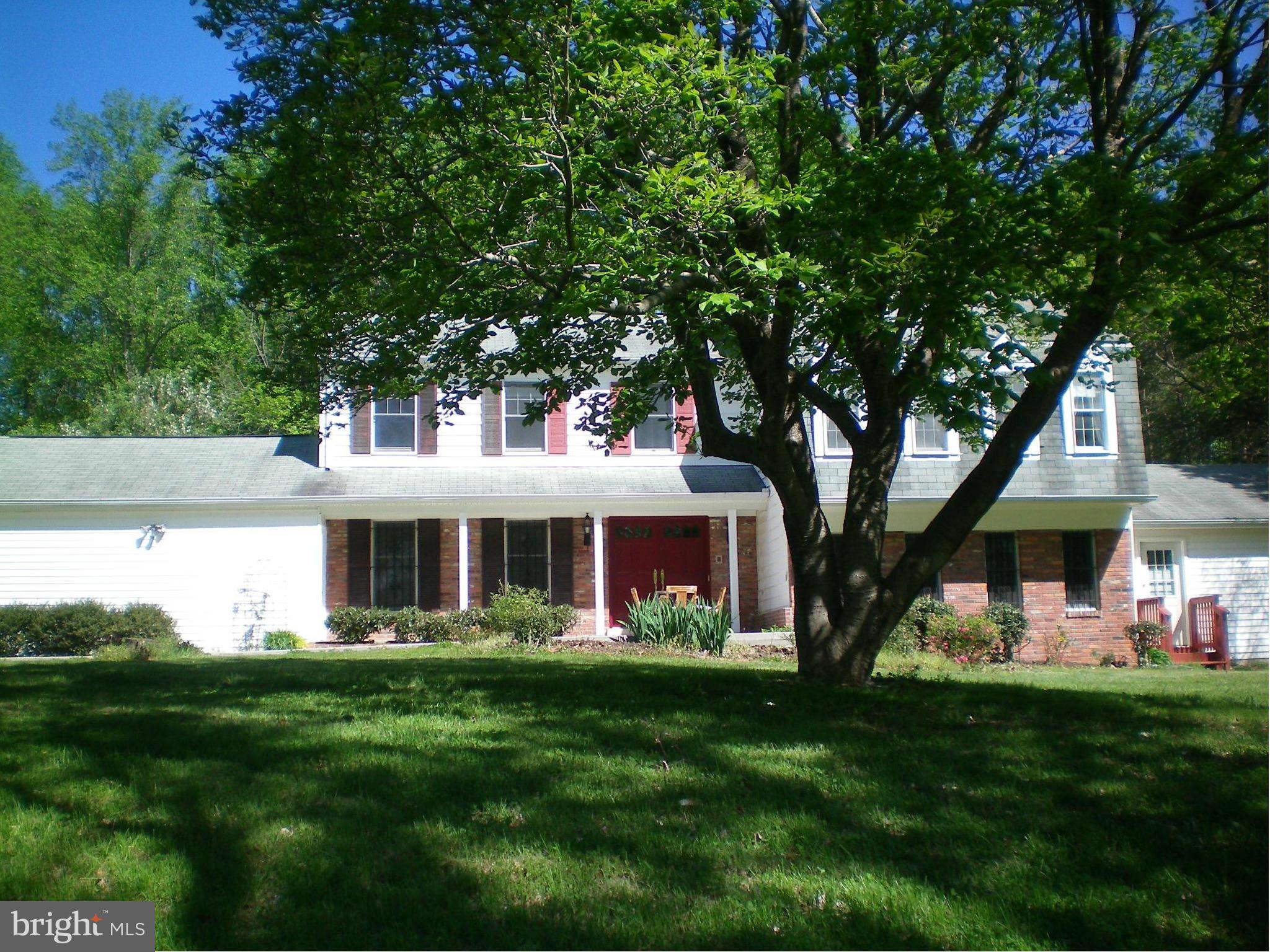 282 Fairhaven Road Tracys Landing, MD 20779 - Photo 1 of 30 a front view of a house with a yard table and chairs
