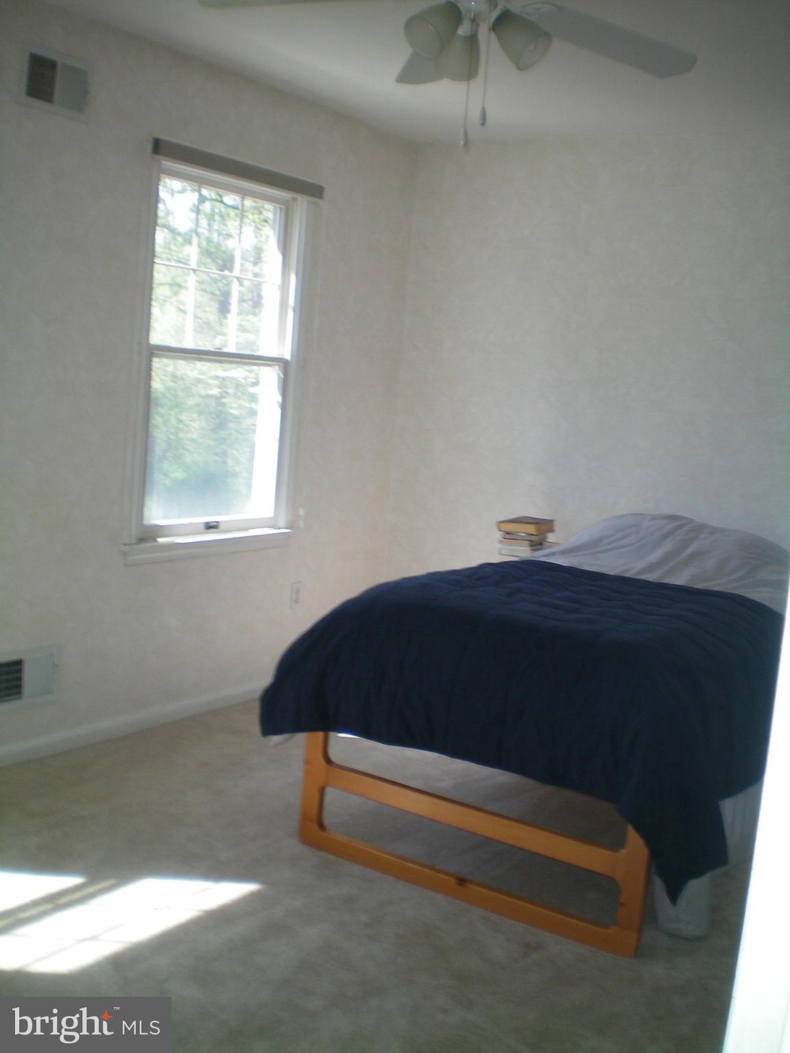 282 Fairhaven Road Tracys Landing, MD 20779 - Photo 13 of 30 a room with a bed and a window