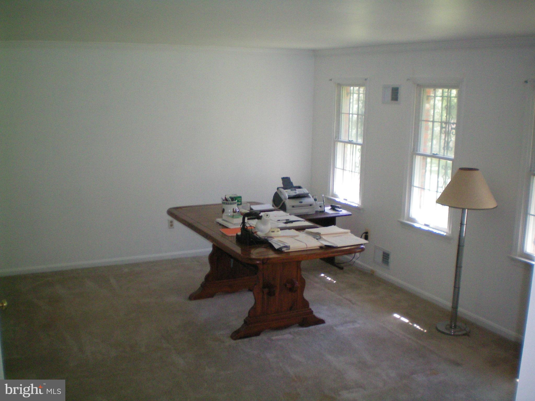 282 Fairhaven Road Tracys Landing, MD 20779 - Photo 16 of 30 a view of a workspace room with a table and chairs in it