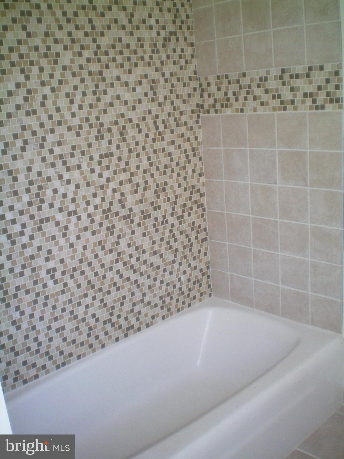 282 Fairhaven Road Tracys Landing, MD 20779 - Photo 18 of 30 a bathroom with a bathtub