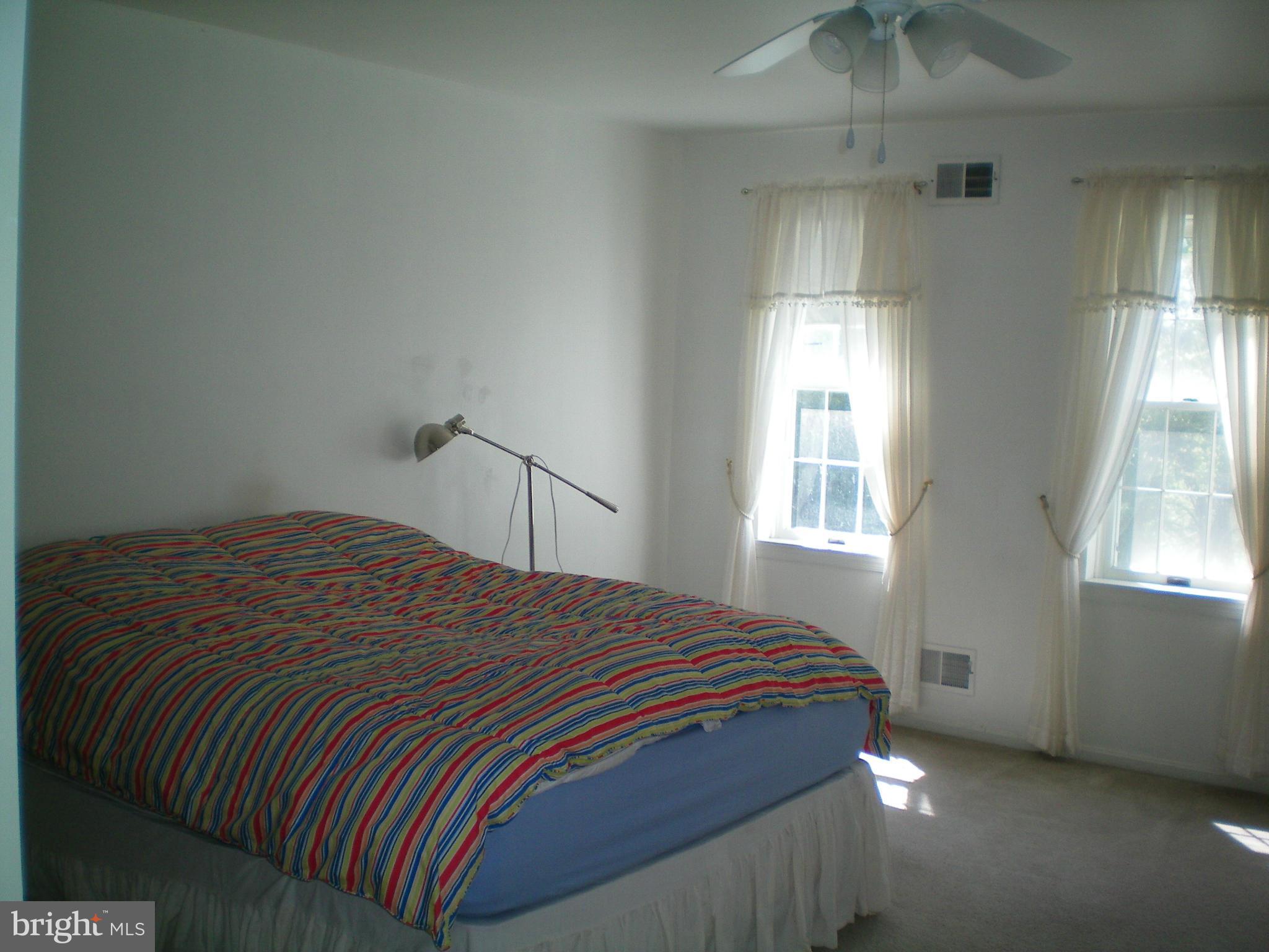 282 Fairhaven Road Tracys Landing, MD 20779 - Photo 9 of 30 a bedroom with a bed and window
