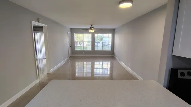 a view of an empty room and window