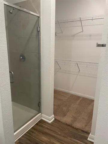 a view of a room with racks on the wall