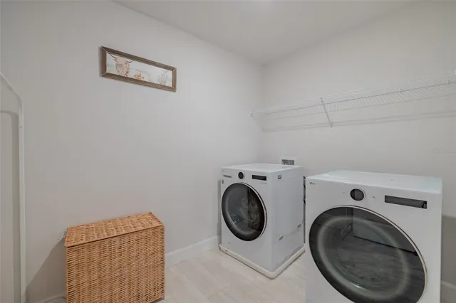 a view of a hallway with a room