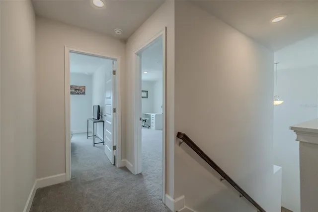 a view of a house with backyard and porch