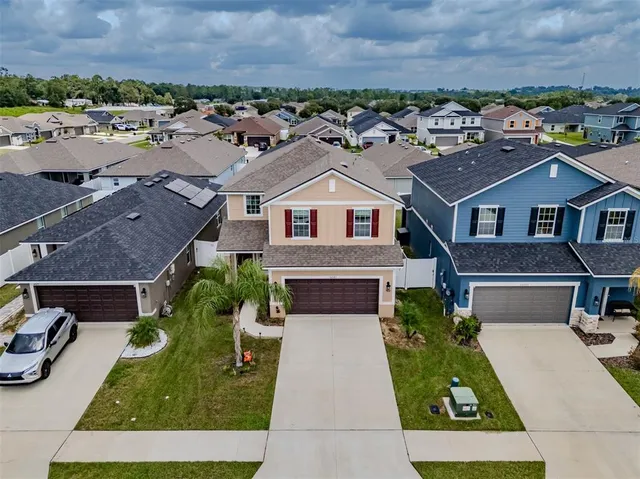 a view of outdoor space with sign board and garden
