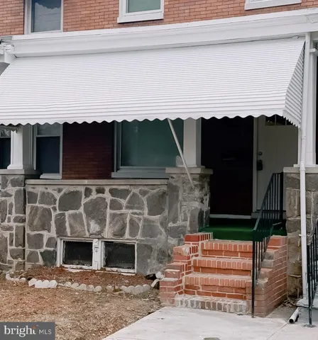 a front view of a house with a garage