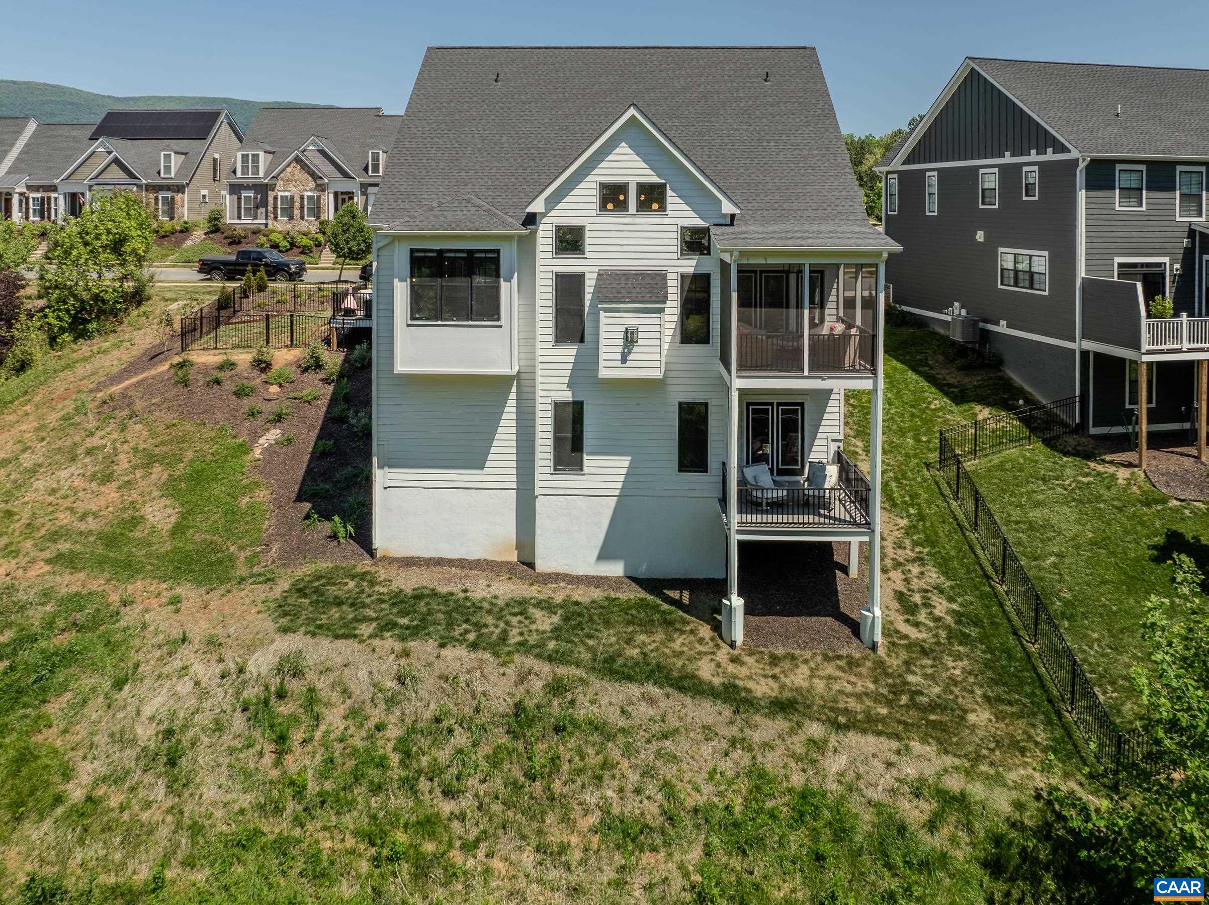 3327 Rowcross Street Crozet, VA 22932 - Photo 3 of 63 Two levels of outdoor living at the rear of the home, with a fenced side yard and composite deck.