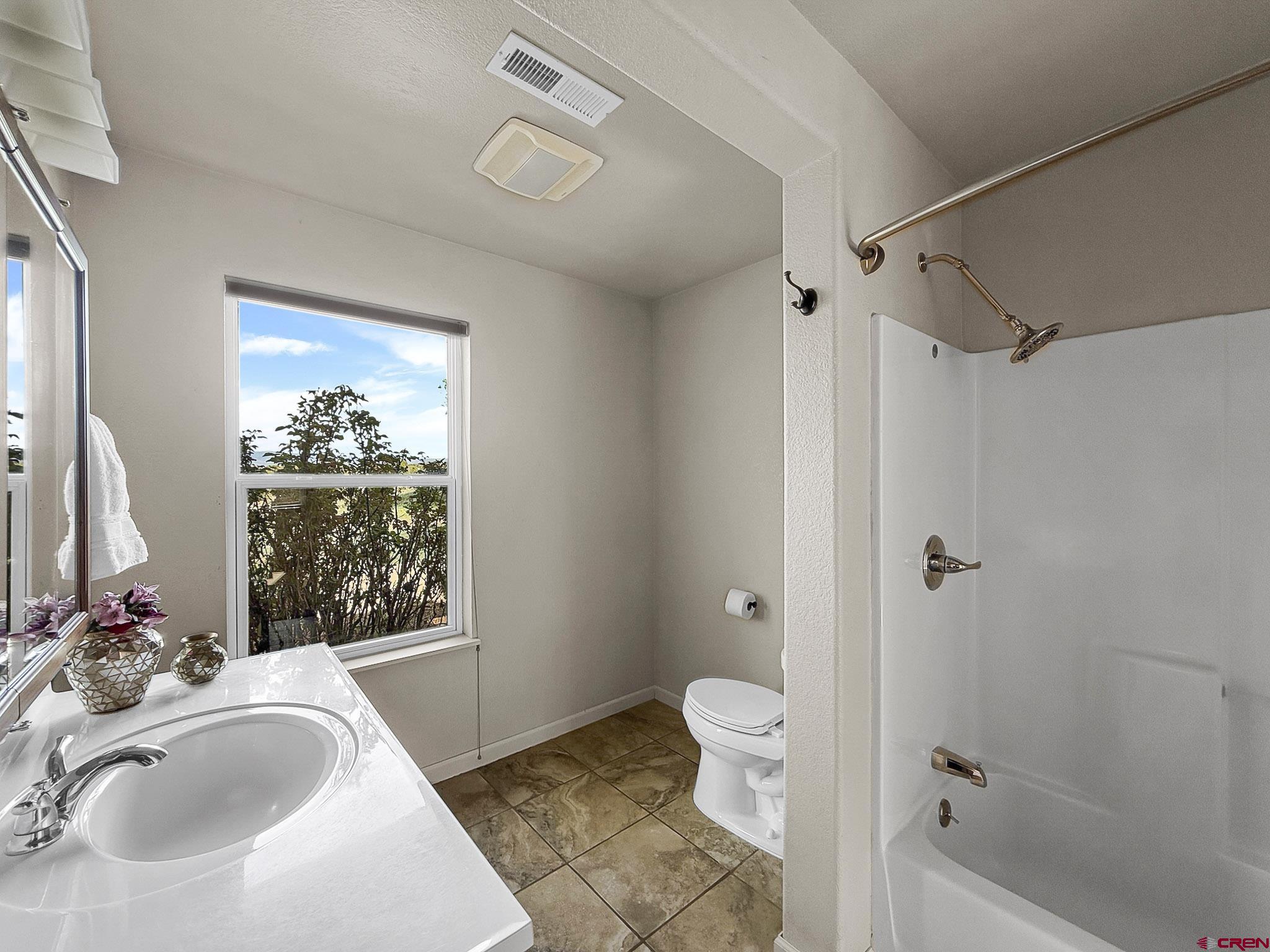 32310 B50 Road Crawford, CO 81415 - Photo 27 of 45 a bathroom with a sink toilet and shower