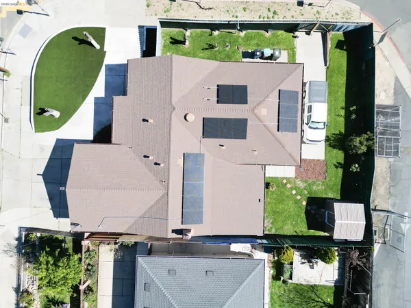 a view of a backyard of the house