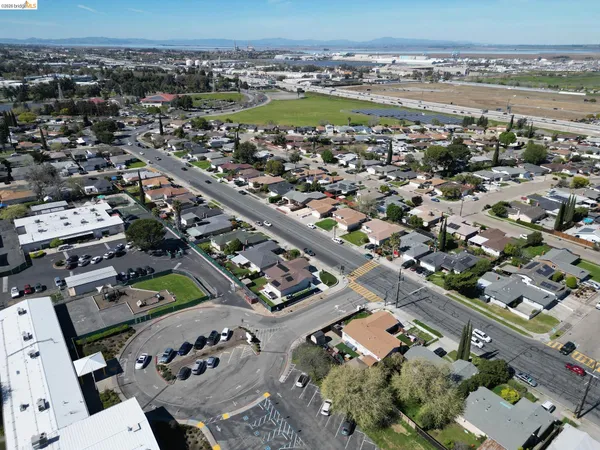 an aerial view of a city with lots of residential buildings