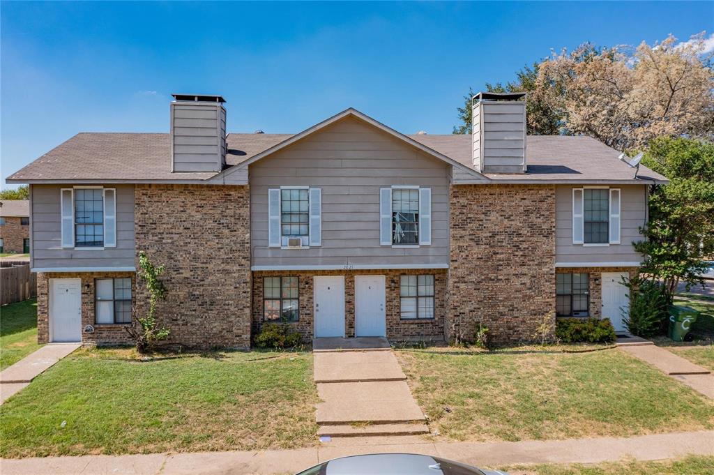 2821 Wimbledon Court Garland, TX 75041 - Photo 20 of 27 a front view of a house with a yard