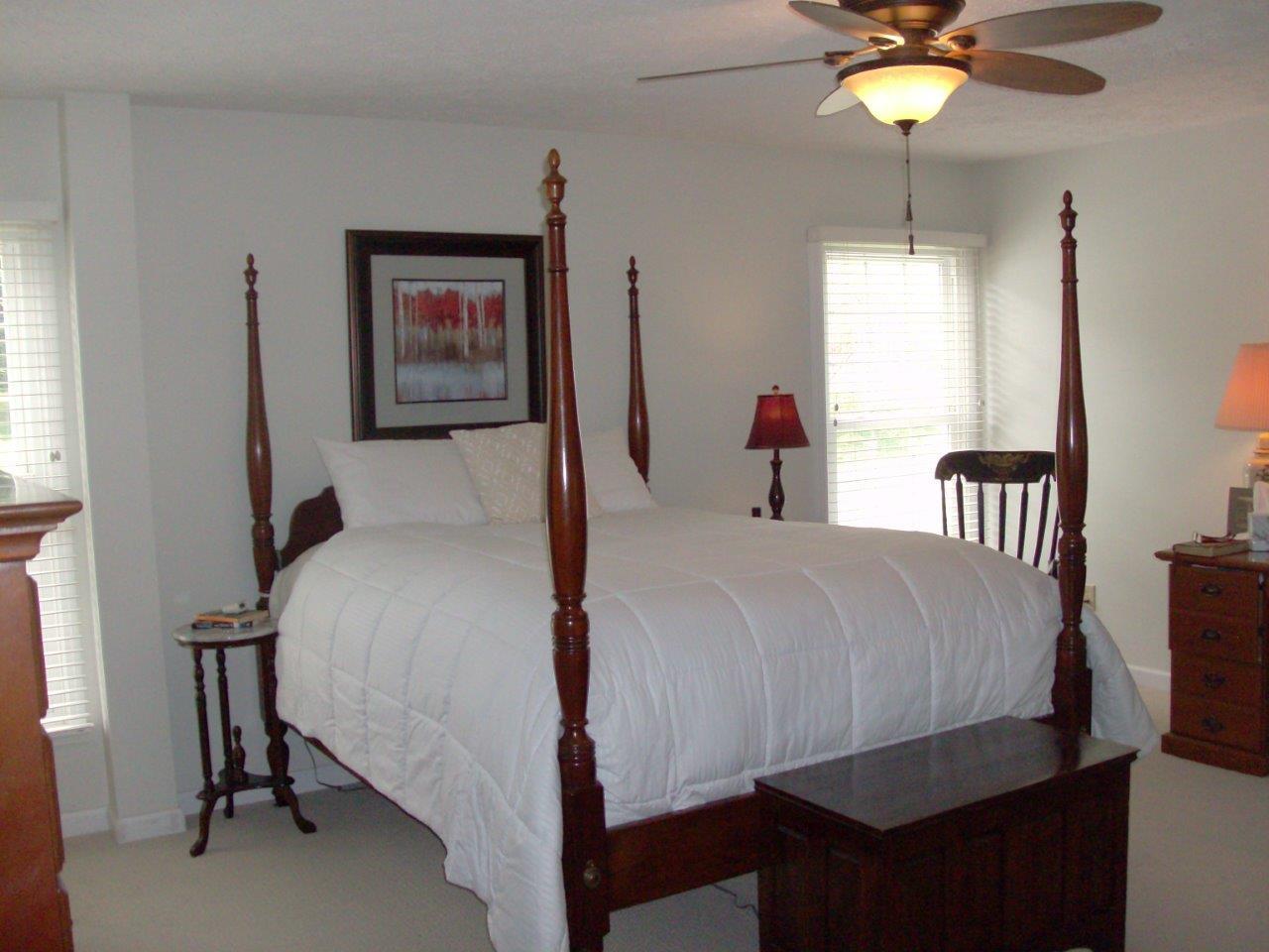 12929 Callaway Road Callaway, VA 24067 - Photo 12 of 59 a bed room with a bed window and a chair