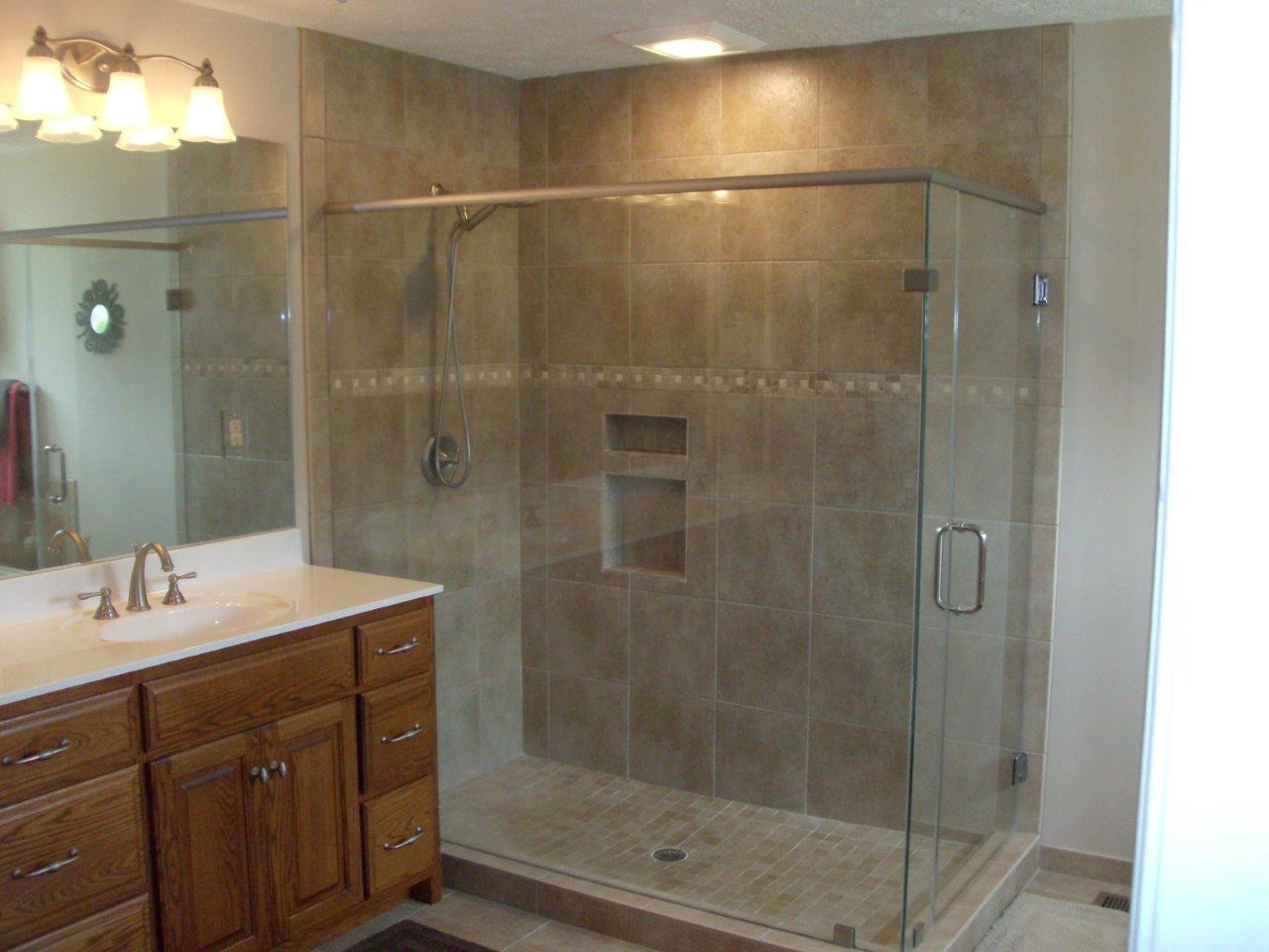 12929 Callaway Road Callaway, VA 24067 - Photo 2 of 59 a bathroom with a shower vanity and a sink