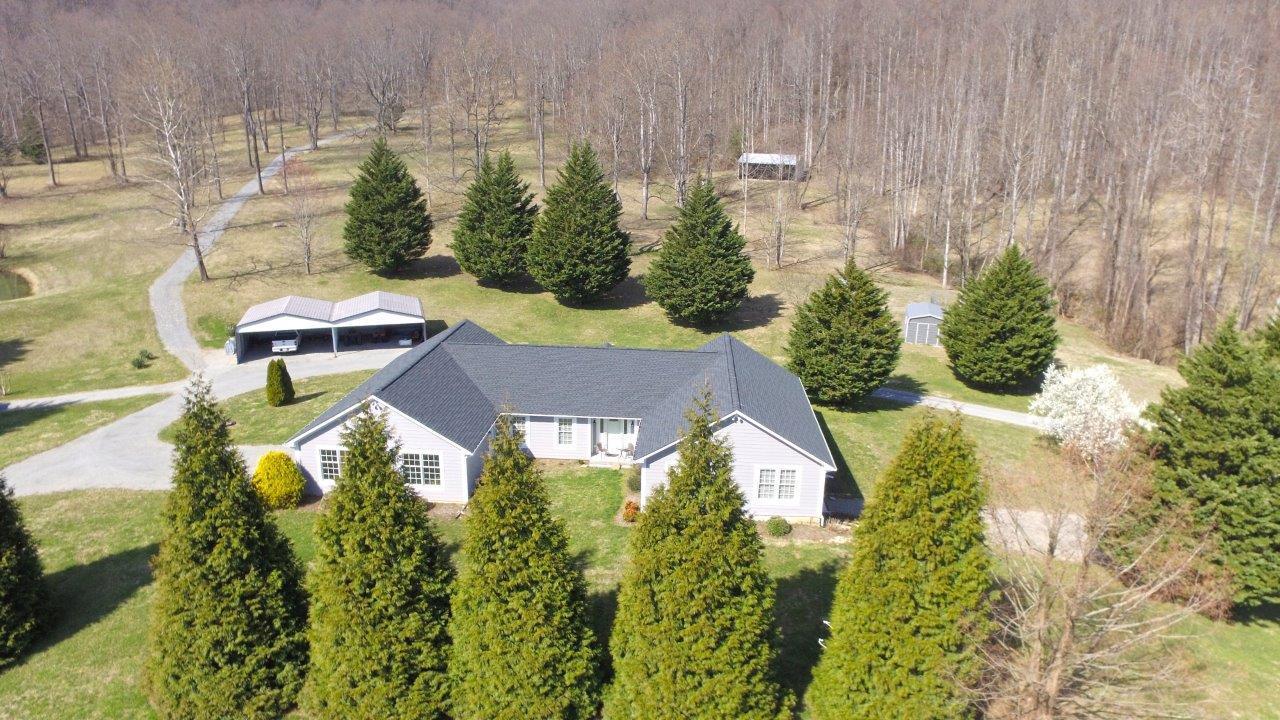 12929 Callaway Road Callaway, VA 24067 - Photo 29 of 59 an aerial view of a house with yard swimming pool and outdoor seating