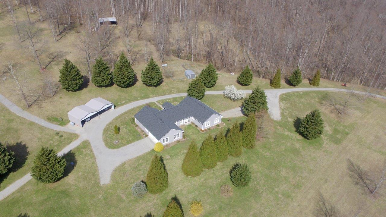 12929 Callaway Road Callaway, VA 24067 - Photo 35 of 59 a view of a swimming pool in a backyard