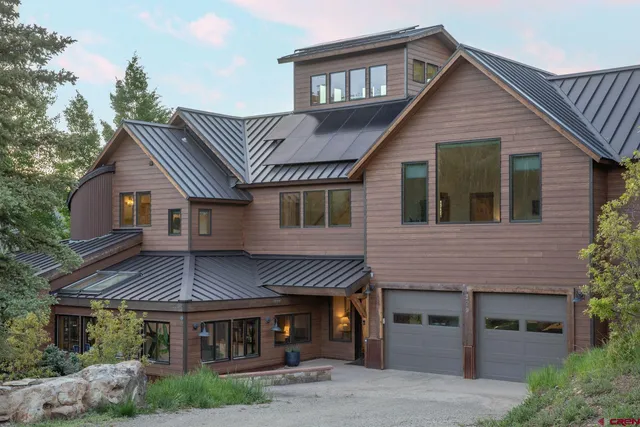 a view of a garage with parked cars