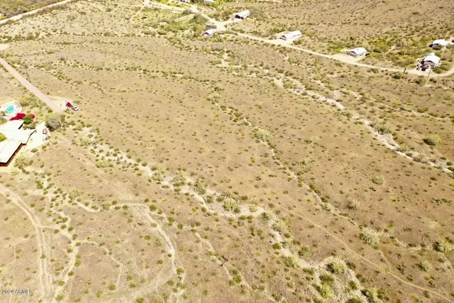 an aerial view of residential building and ocean