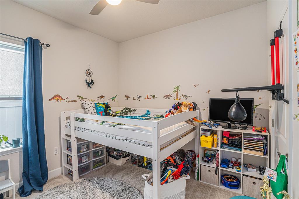 19056 Heavenside Ct Spring Hill Spring Hill, FL 34610 - Photo 19 of 25 a view of a dining room with furniture and toys