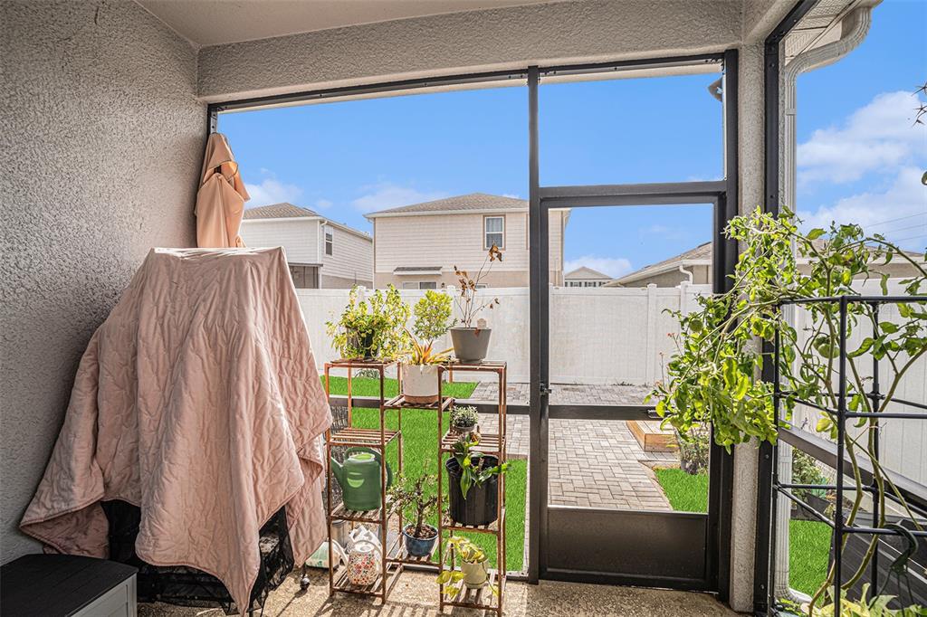 19056 Heavenside Ct Spring Hill Spring Hill, FL 34610 - Photo 21 of 25 a view of balcony with two potted plants