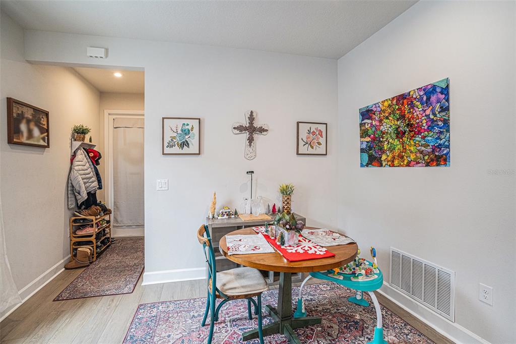 19056 Heavenside Ct Spring Hill Spring Hill, FL 34610 - Photo 5 of 25 a view of a room that has a table and a chair