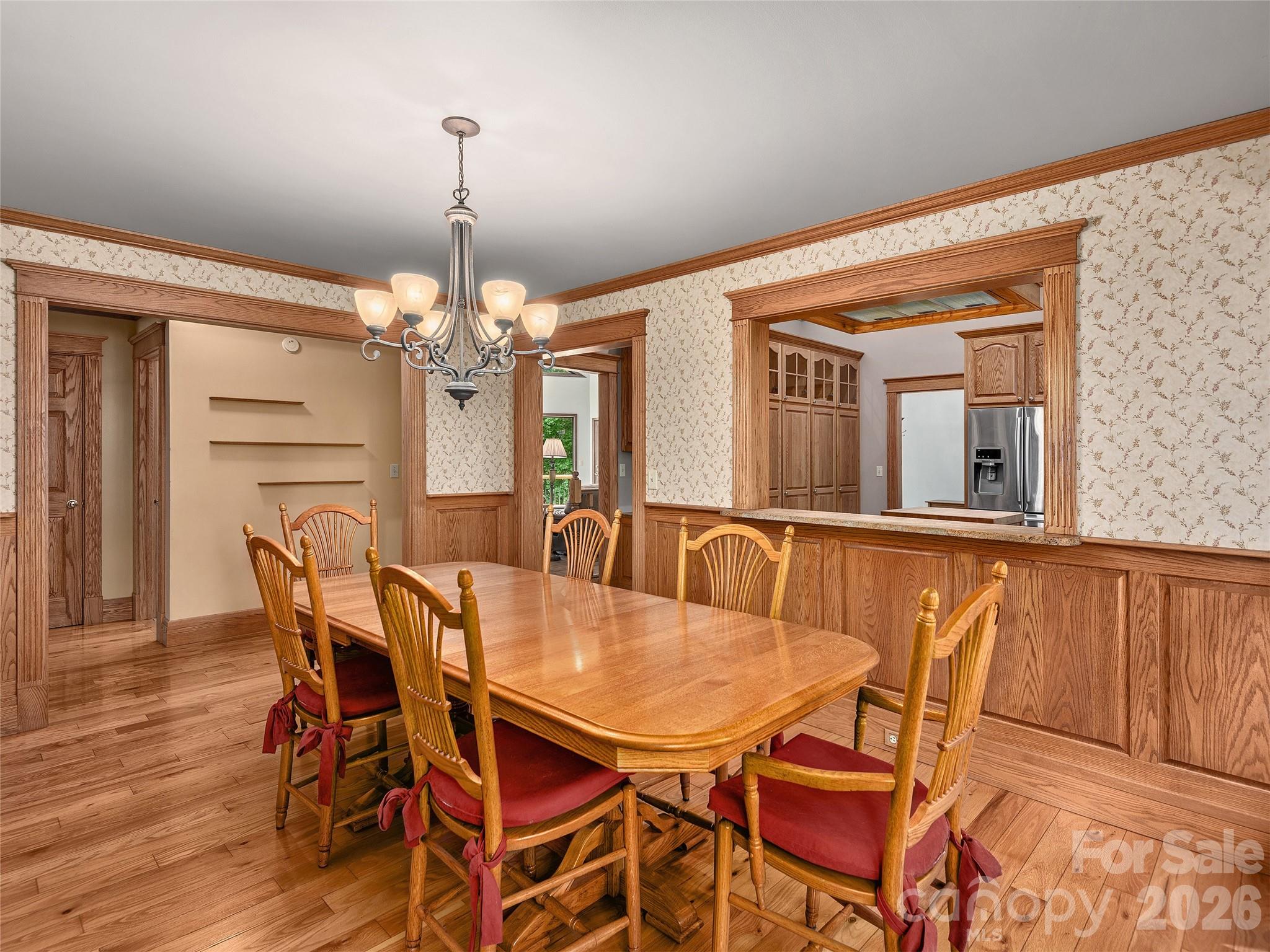 40 Deer Ridge Road Mills River, NC 28759 - Photo 6 of 35 a view of a dining room with furniture and a chandelier