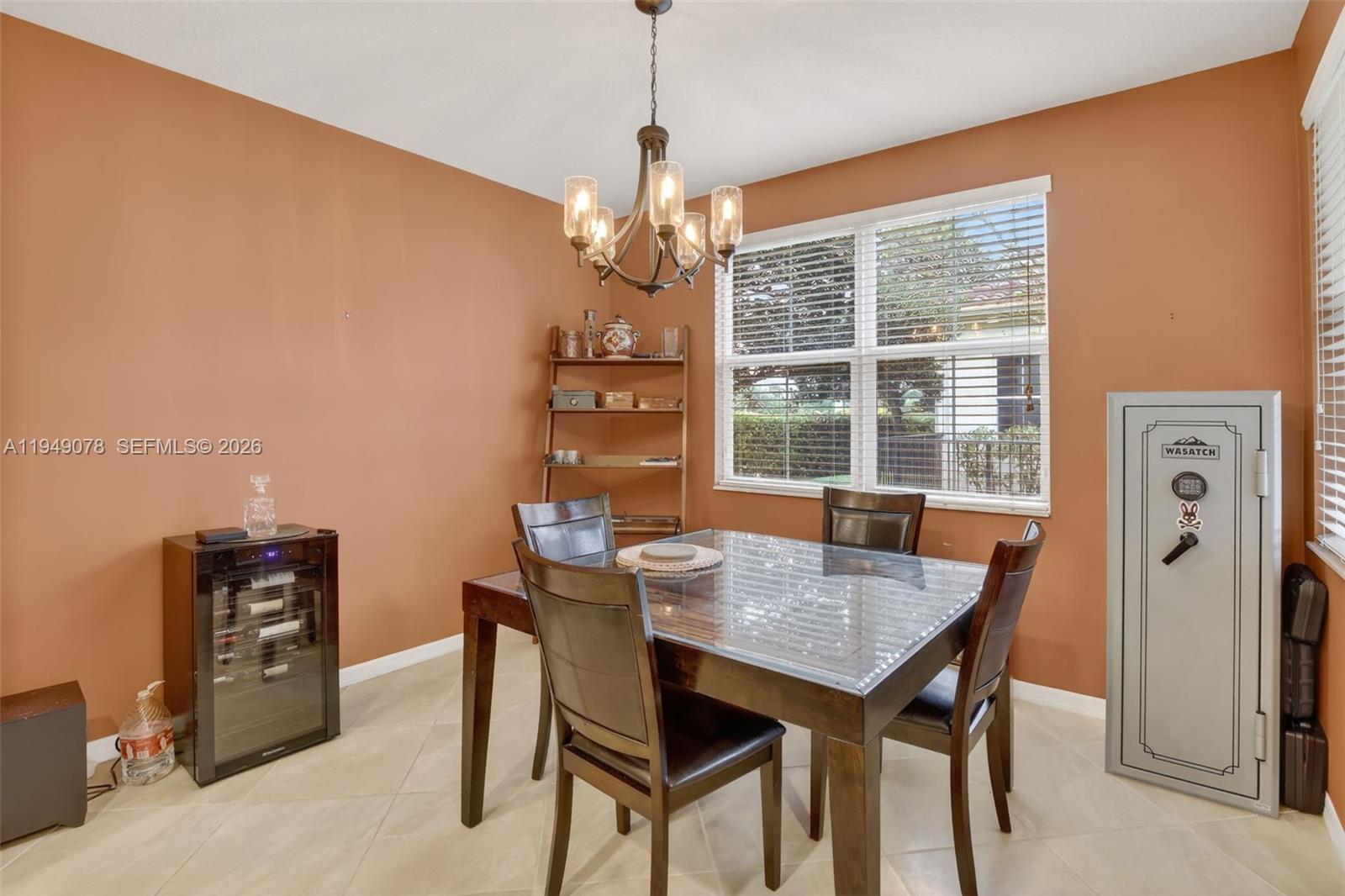 5208 Falcon Trail Davie, FL 33314 - Photo 16 of 49 a view of a dining room with furniture window and outside view