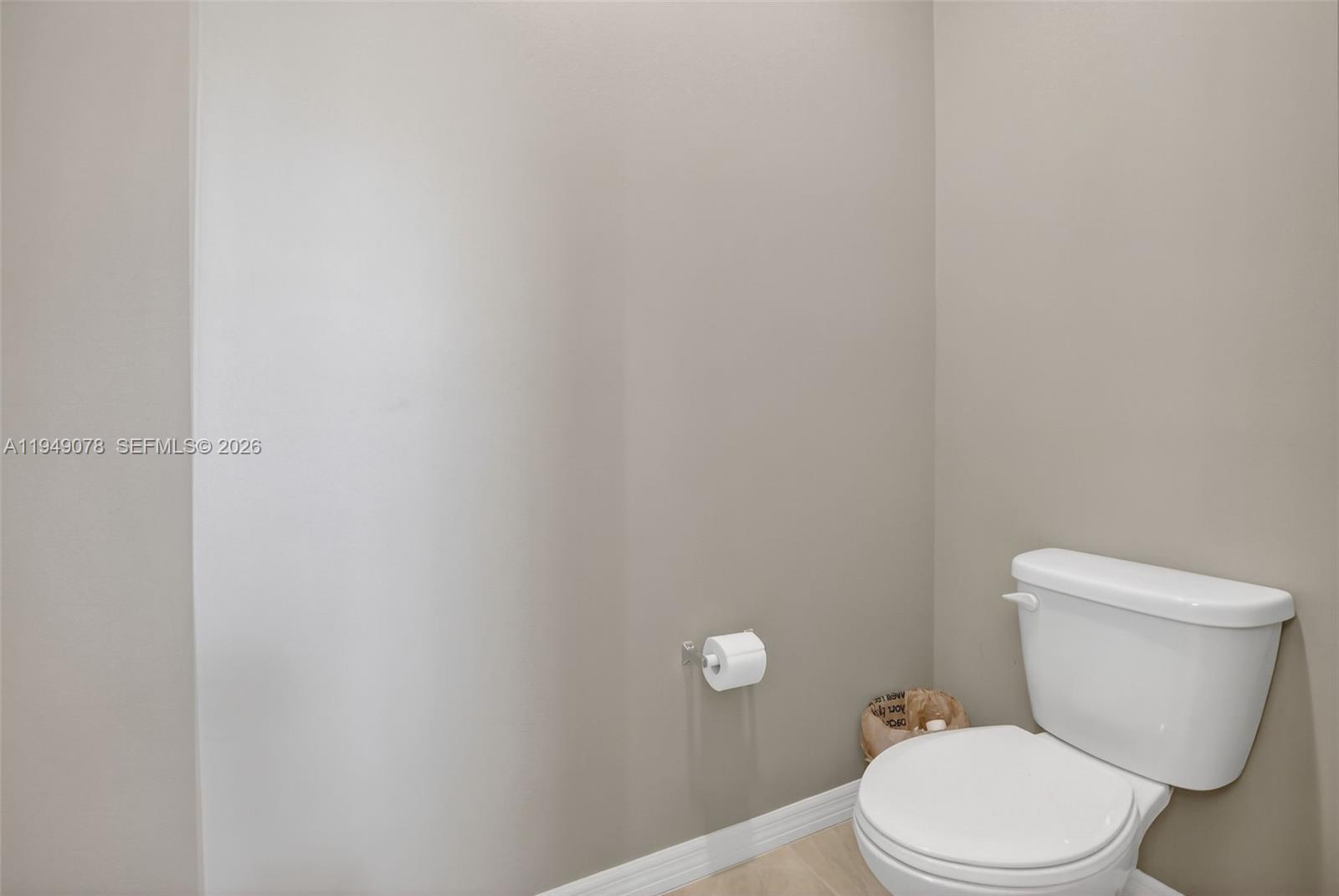 5208 Falcon Trail Davie, FL 33314 - Photo 25 of 49 a white toilet sitting next to a white wall