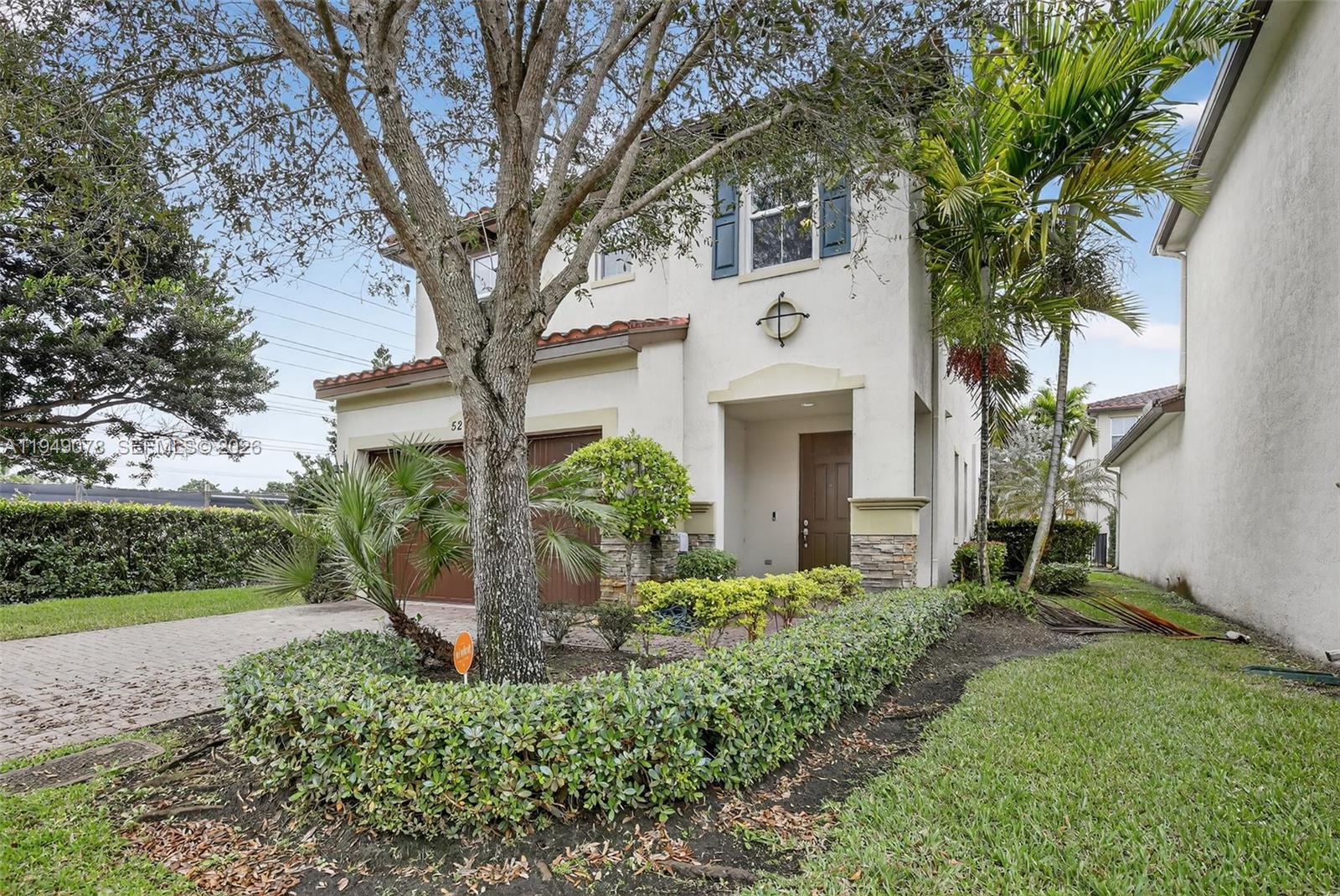 5208 Falcon Trail Davie, FL 33314 - Photo 3 of 49 a view of a house with a yard and plants