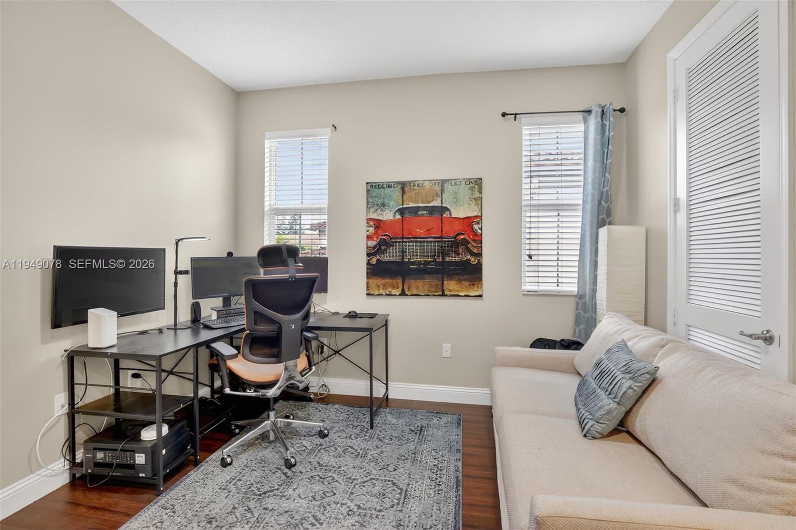 5208 Falcon Trail Davie, FL 33314 - Photo 33 of 49 a living room with furniture and a flat screen tv