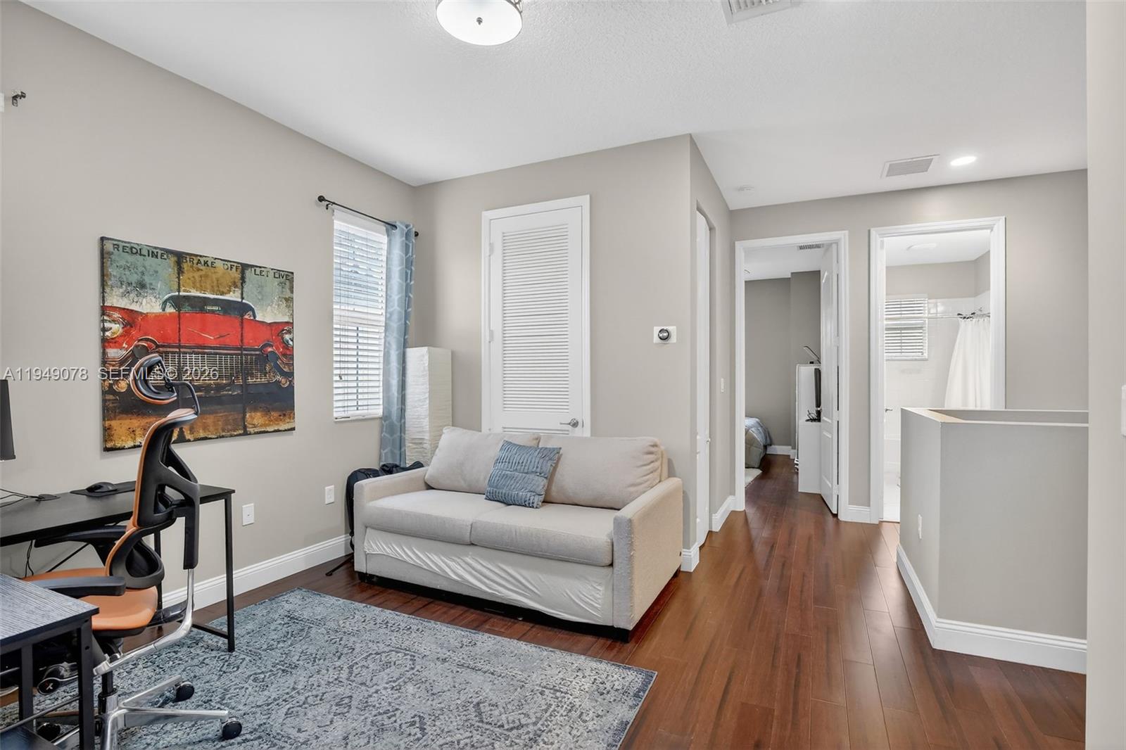 5208 Falcon Trail Davie, FL 33314 - Photo 34 of 49 a living room with furniture and a flat screen tv