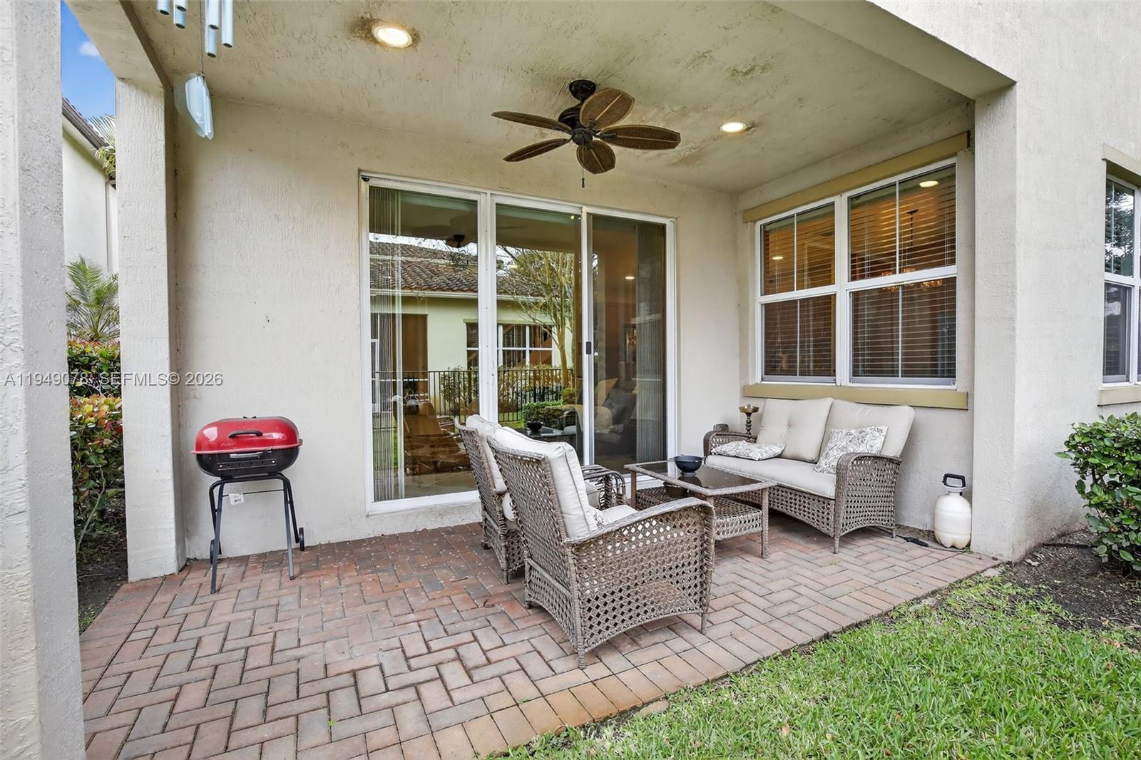 5208 Falcon Trail Davie, FL 33314 - Photo 38 of 49 a living room with patio furniture and a potted plant