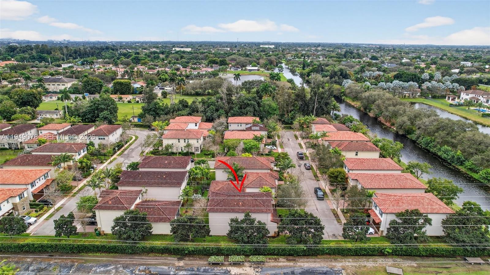 5208 Falcon Trail Davie, FL 33314 - Photo 43 of 49 an aerial view of residential houses with outdoor space and parking