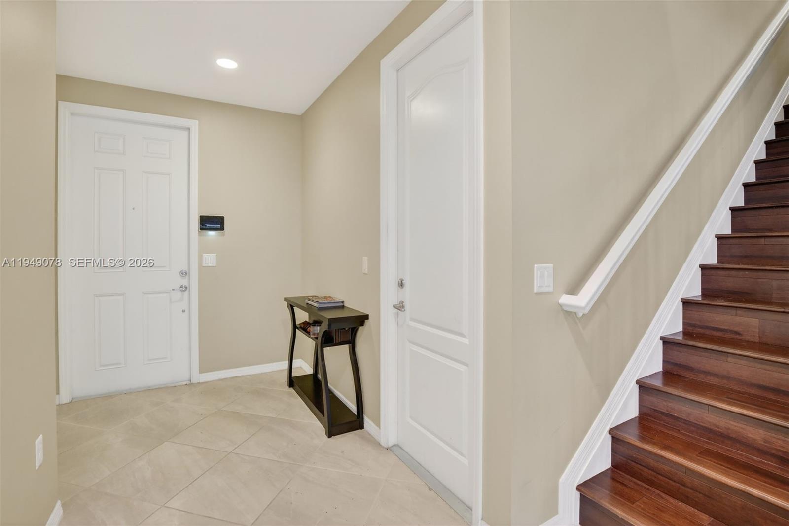 5208 Falcon Trail Davie, FL 33314 - Photo 5 of 49 a view of entryway with wooden floor