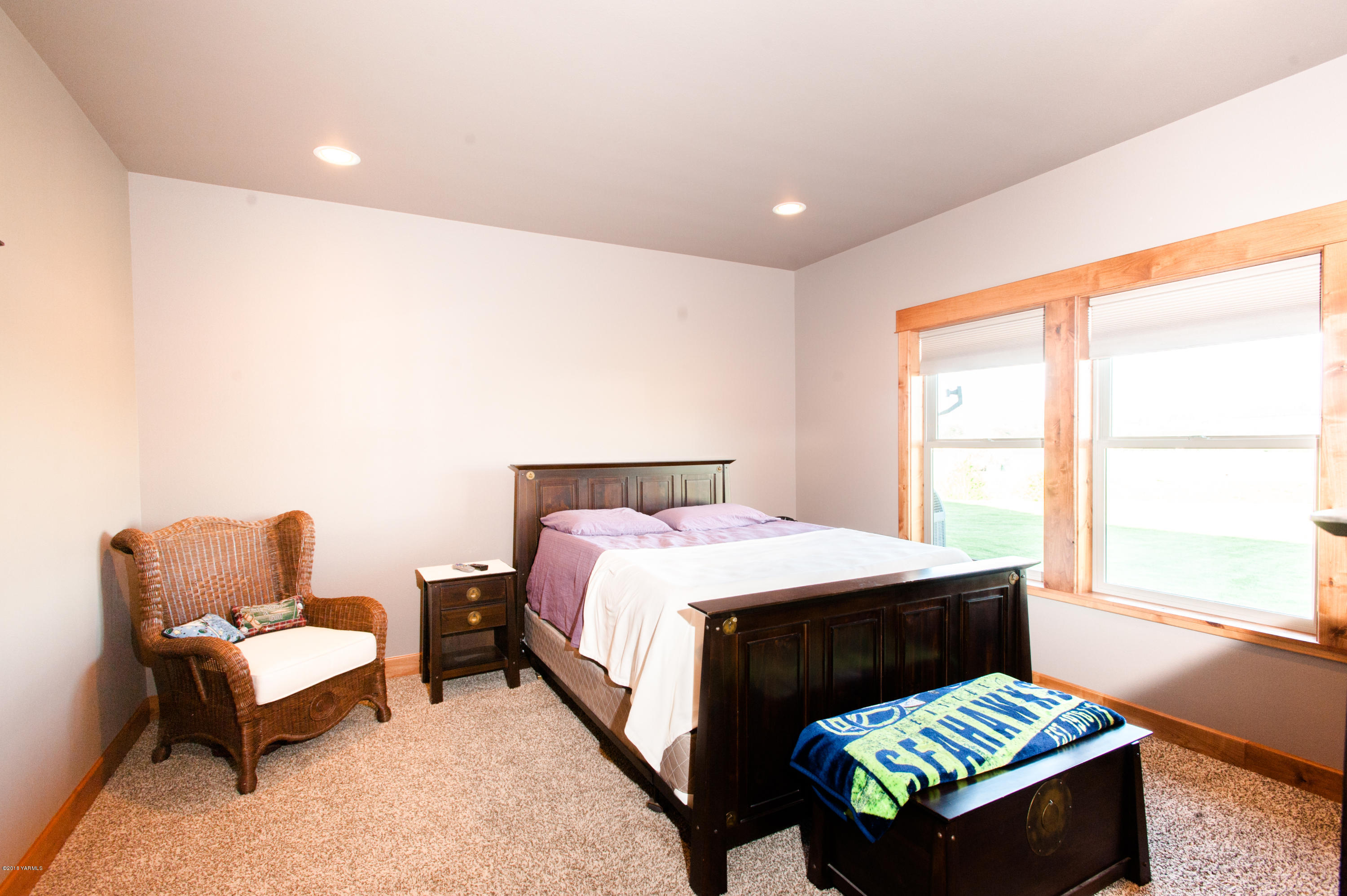 6571 South Naches Road Naches, WA 98937 - Photo 22 of 26 a bedroom with a bed and a couch