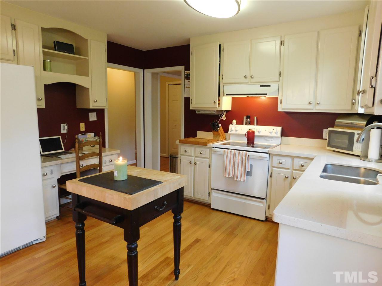 8357 Greywinds Drive Raleigh, NC 27615 - Photo 5 of 25 Built-in-desk and double pantry