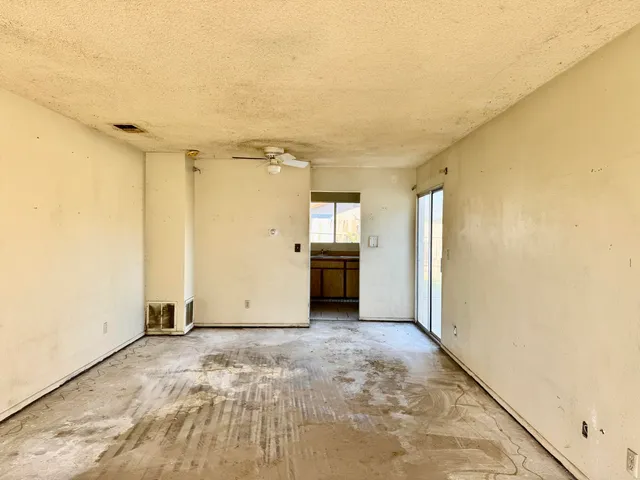 a view of a livingroom with wooden floor