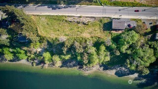 1943 Wheaton Way Bremerton, WA 98310 - Photo 7 of 10 a view of a garden with a building
