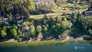 1943 Wheaton Way Bremerton, WA 98310 - Photo 8 of 10 a view of a lake with houses